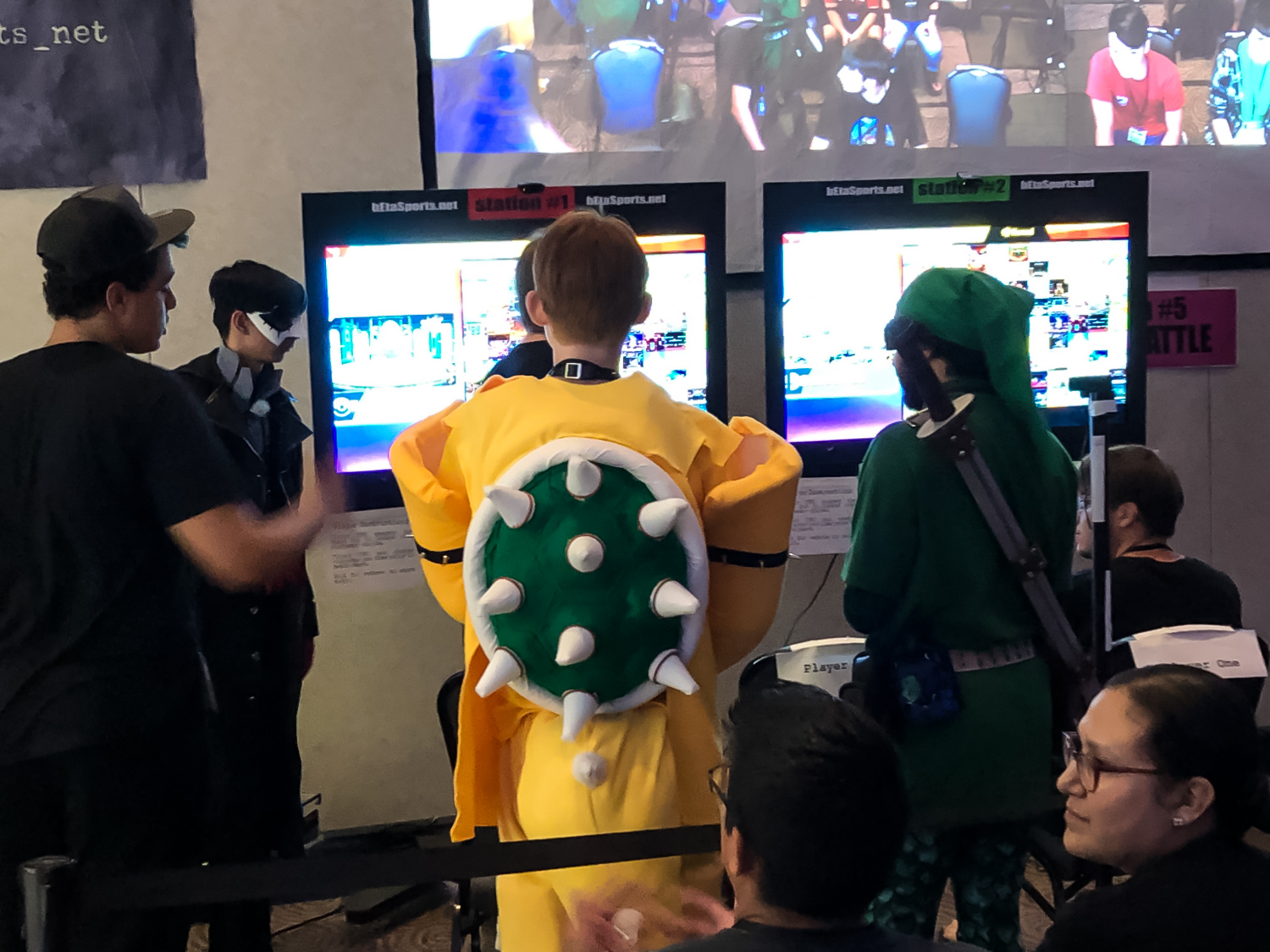 Cosplayers Bowser and Link take direction for bEta Sports' Joker during the Smash-a-palooza tournament at the Berry Center, in Cypress, Texas, July 27, 2019. (Cypress News Review photo by Creighton Holub)