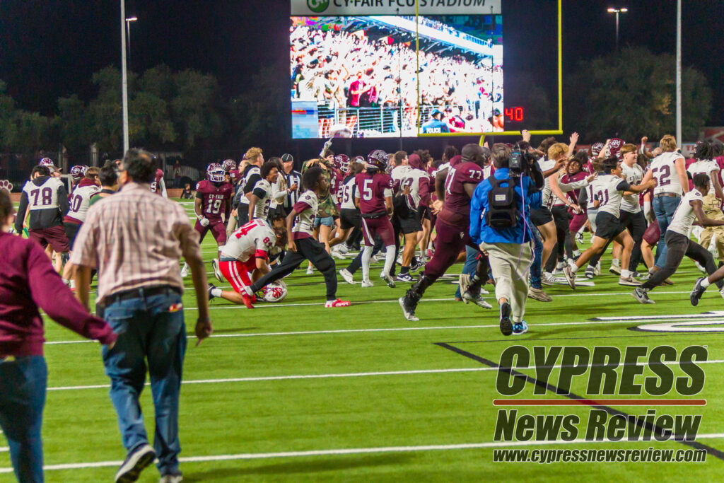 The CyFair sidelines take the field after overcoming the impossible of ousting the Katy Tigers last Friday night. The CyFair Bobcats defeated the Katy Tigers for an area championship, 28-21, in single overtime at the Berry Center, on Friday, Nov. 17, 2023. (photo by Creighton Holub, courtesy Ronin Visuals)